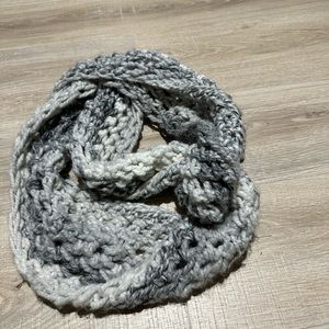 Woman’s gray knit infinity scarf